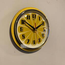 Honeydew Yellow Atomic Wall Clock Mid-Century Jetsons Style - thumbnail 2