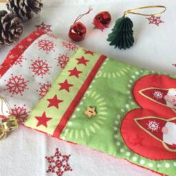 Hand Quilted Christmas Stocking With A Scandi Tree Design, Mr & Mrs Gnome Stocking Bells, Lined Brushed Cotton - thumbnail 3