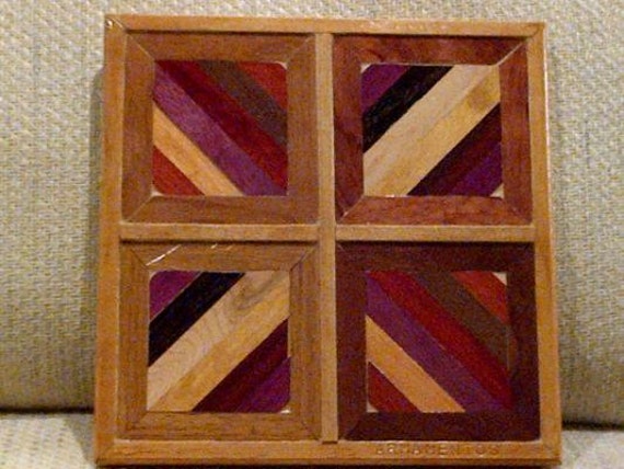 Wood Wall Art Sculpture Featuring A Variety Of Exotic Wood Pieces in Geometric Array
