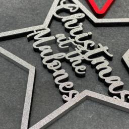 Personalised Coloured Star Christmas Tree Decoration, Wooden Family Name Bauble, Keepsake Bauble Gift, Festive Decoration - thumbnail 3