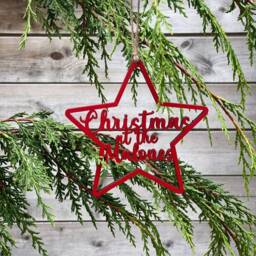 Personalised Coloured Star Christmas Tree Decoration, Wooden Family Name Bauble, Keepsake Bauble Gift, Festive Decoration - thumbnail 1