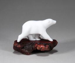 Polar Bear Cub On Burlwood Slab By John Perry - thumbnail 1