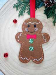 Felt Gingerbread Man Hanging Decoration For Christmas Tree - Personalised Holiday Gift With Custom Bow Tie & Buttons - thumbnail 1