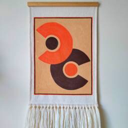 Hand-Painted Wall Hanging Orange Brown Geometric Design With Wool Fringe - thumbnail 2