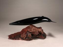 Fin Whale From John Perry 14In Long Ebonite Sculpture On Burlwood Base - thumbnail 1