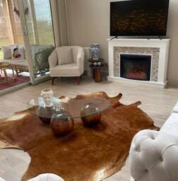 Round Glass Coffee Table With Handmade Lime Wood Ball Base - thumbnail 3