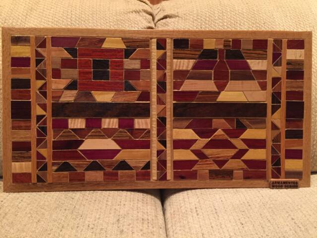 Wood Wall Art Sculpture Featuring A Variety Of Exotic Wood Pieces in Several Geometric Mosaic Arrays With Triangle Hardwood Inlays - image 1