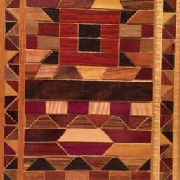 Wood Wall Art Sculpture Featuring A Variety Of Exotic Wood Pieces in Several Geometric Mosaic Arrays With Triangle Hardwood Inlays - thumbnail 3