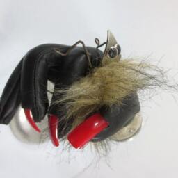 Odd Furry Little Creature Held Gently in A Bizarre Red -Taloned Hand - thumbnail 3