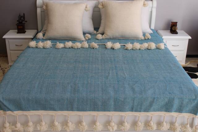 Moroccan Pom Turquoise Cotton Blanket & Throw With Braided Tassels Loomed By Hand For Eclectic Bohemian Berber Decoration - image 1
