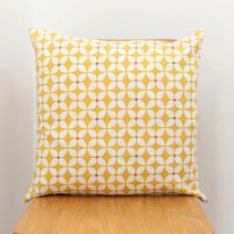 Quirky Retro Geometric Printed Cushion in Summer Yellow. Floral Star Design With Multicoloured Detail. 100% Cotton, 17 - thumbnail 1