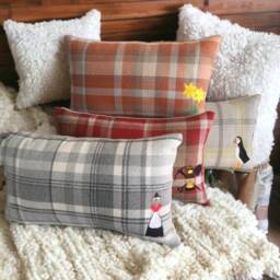Embroidered Cushions With Welsh Motifs, Lady, Miners Lamp, Daffodils, Puffin - thumbnail 1