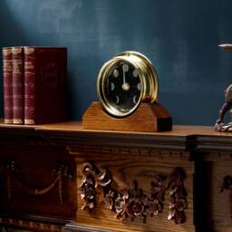 Prestige Brass Moon Phase Clock With A Jet Black Dial Mounted On Solid English Oak Mantel/Display Mount - thumbnail 2