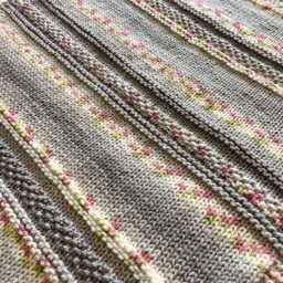 Cosy Hand Knitted Baby Blanket ~ Chunky Yarn Grey & Blossom Easy Care - thumbnail 3