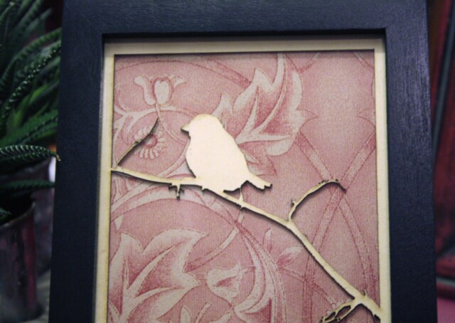 Framed Art. Laser Cut Bird On A Branch With Vintage Wallpaper in Black Frame - image 1