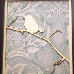 Framed Art. Laser Cut Bird On A Branch With Vintage Wallpaper in Black Frame - thumbnail 2