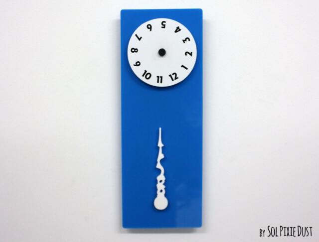 stable Hand, Rotating Numbers - Blue Wall Clock - image 1