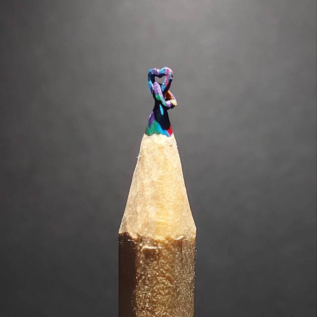 Hand Carved Interlocked Hearts Pencil Sculpture - Glass Dome - image 1
