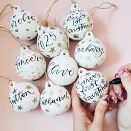 Personalised Bauble Christmas Decoration Personalised With Name Or Message in Hand Lettered Calligraphy - thumbnail 1