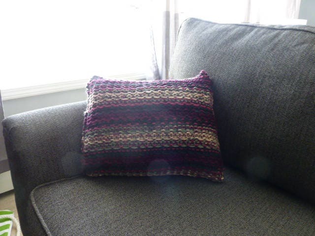 Red, Black, & Pink Knitted Pillow - image 1