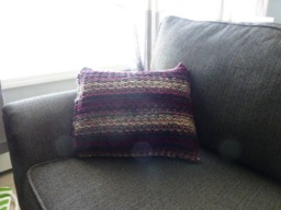 Red, Black, & Pink Knitted Pillow