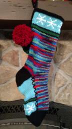 Hand Knit Christmas Stocking Purple Red Turquoise Blue Green Snowflake Detail By Santa's Works - thumbnail 1