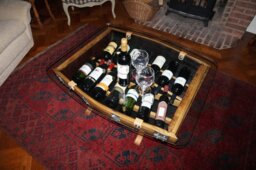 The Griffiths. 1/2 Barrel Glass Topped Coffee Table & Wine Rack - thumbnail 1