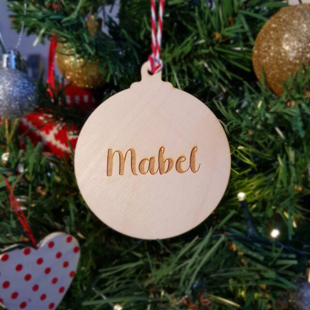 Personalised Wooden Christmas Bauble - Custom Engraving Simply Send Us The Name You Wish To Add On - image 1