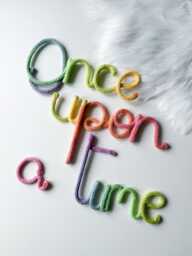 "Rainbow Knitted Wire Sign Kids Room Decor - ""Once Upon A Time" - thumbnail 1