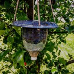 stoneware Pottery Hummingbird Feeder With Leather Hanger - thumbnail 3