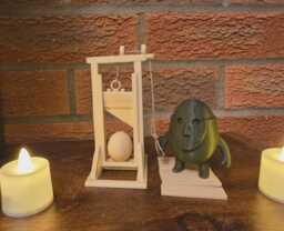 Eggsacutioner Fun Easter Ornament With Moveable Parts Novelty Gift - thumbnail 1