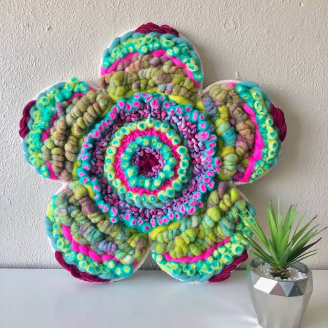 Groovy 19-Inch Flower-Shaped Woven Wall Hanging - image 1