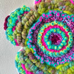 Groovy 19-Inch Flower-Shaped Woven Wall Hanging - thumbnail 2
