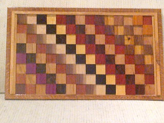 Wood Wall Art Sculpture Featuring A Variety Of Exotic Wood Pieces in Three Dimensional, Geometric Checkerboard-Like Array - image 1