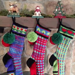Hand Knit Christmas Stocking Purple Rainbow With Red Flower Detail By Santa's Works - thumbnail 3