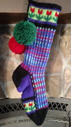 Hand Knit Christmas Stocking Purple Rainbow With Red Flower Detail By Santa's Works - thumbnail 1