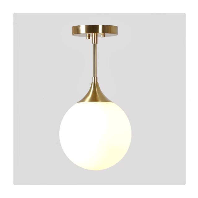 Mid Century Modern Brass Pendant Light, Handblown Glass Globe - image 1