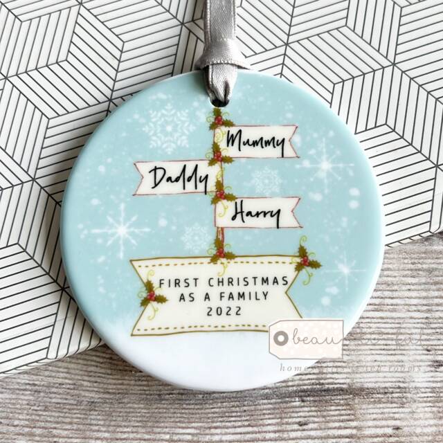 Personalised First Christmas As A Family Mummy Daddy New Baby Snowflake Signpost Design Ceramic Round Ornament Keepsake - image 1