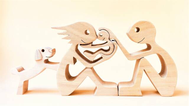 A Couple, Child, Poodle Wood Sculpture - image 1