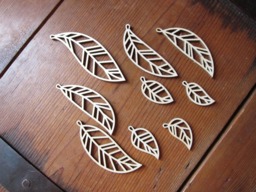 Wooden Feather & Leaf Christmas Ornaments - Set Of 9 Birch Plywood Decorations - thumbnail 1