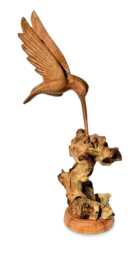 Single Hovering Hummingbird Feeding From Wooden Base - thumbnail 1