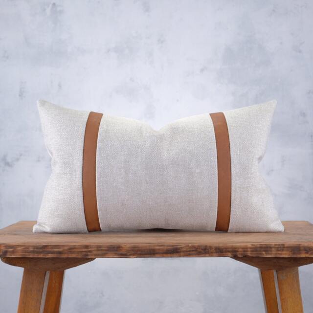 Retro-Inspired Neutral Lumbar Pillow Cover With Faux Leather Stripe Details - image 1