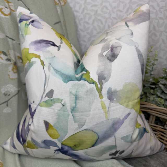 Vibrant Handmade Cushion Cover Featuring Abstract Multicoloured Leaves in Voyage Fabric - image 1