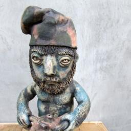 Ceramic Garden Gnome With A Chainsaw