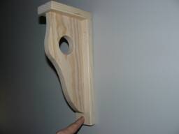 Elegant Shelf Bracket With Rod Holder