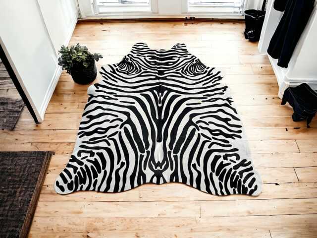 Cowhide Rug - Stenciled With Black & White Zebra Print Pattern - image 1
