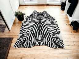 Cowhide Rug - Stenciled With Black & White Zebra Print Pattern - thumbnail 1