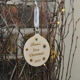 Personalised Wooden Baby's First Christmas Decoration Bauble - thumbnail 3
