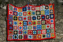 New Handmade Crocheted Baby Blanket, Kobe, Multicolored Granny Squares, Red Border, Birthgift - thumbnail 1