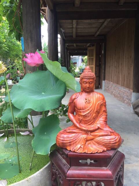 Sitting Wooden Buddha in Japanese Style - image 1